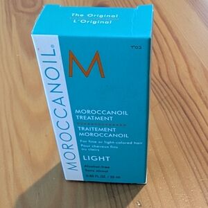 Moroccanoil Light Treatment - Teal Box with Orange Accent